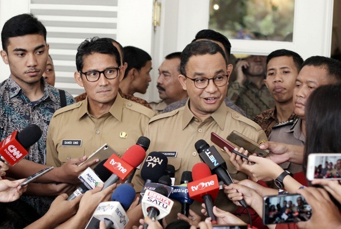 Gubernur DKI Anies Baswedan dan Wakil Gubernur Sandiaga Uno. - Image