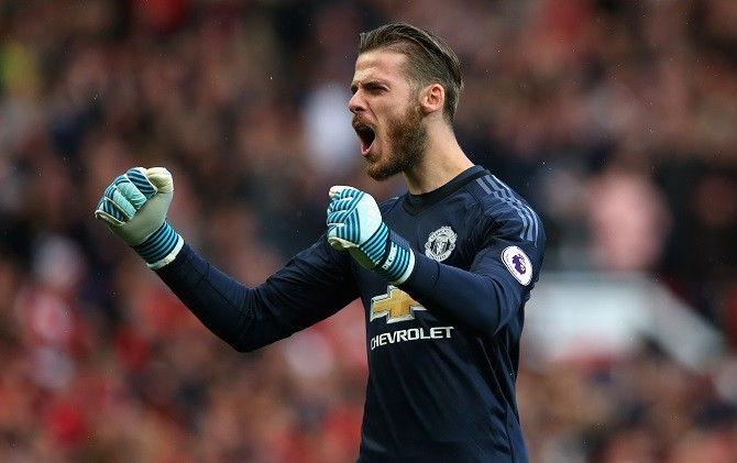 David de Gea berpeluang menambah koleksi trofinya musim ini bersama Manchester United. - Image