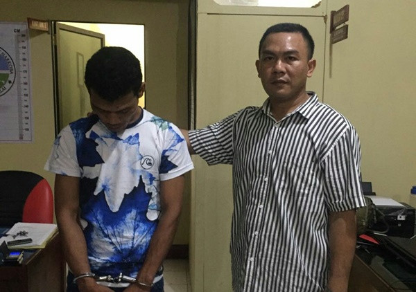 HER saat berada di Kantor Polisi setelah diamankan di kediamannya. - Image