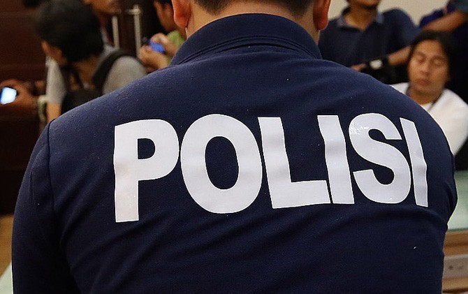 Ilustrasi polisi menerima laporan korban yang ditinggalkan sang pacar - Image