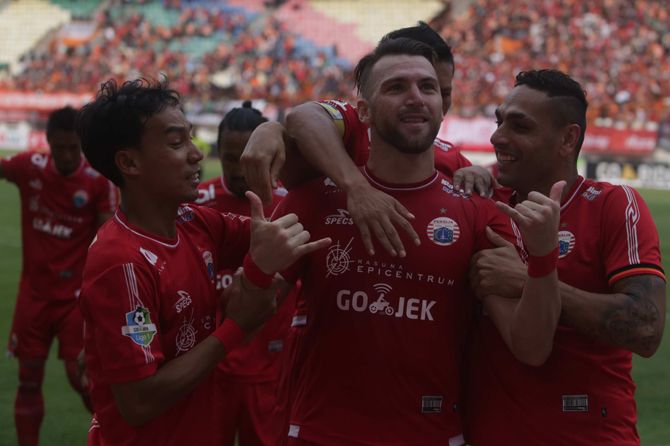 Persija Jakarta berhak atas puncak klasemen sementara Liga 1 2018 usai menundukkan Sriwijaya FC - Image