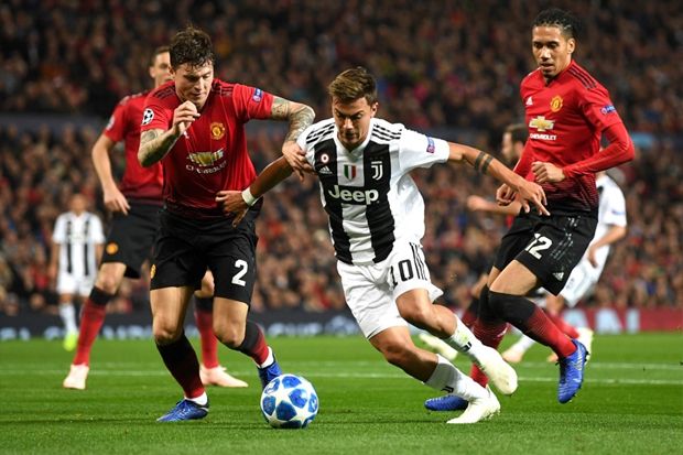 Pada pertemuan pertama di Liga Champions musim ini, Juventus menang 1-0 di markas Manchester United. - Image