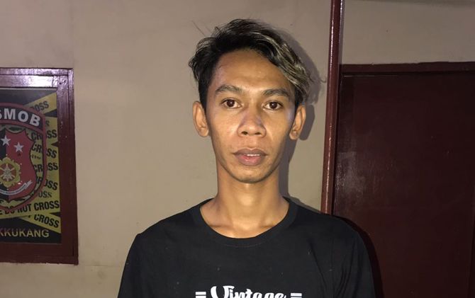 M. Qadri, pelaku penyebar foto bugil mantan pacarnya sendiri. - Image