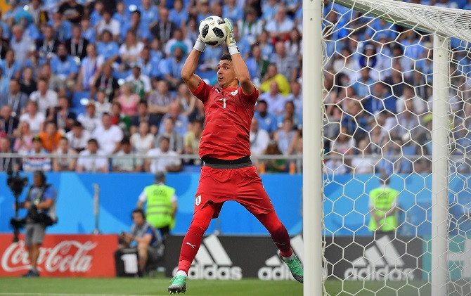 Fernando Muslera torehkan penampilan ke-100 bersama La Celeste. - Image