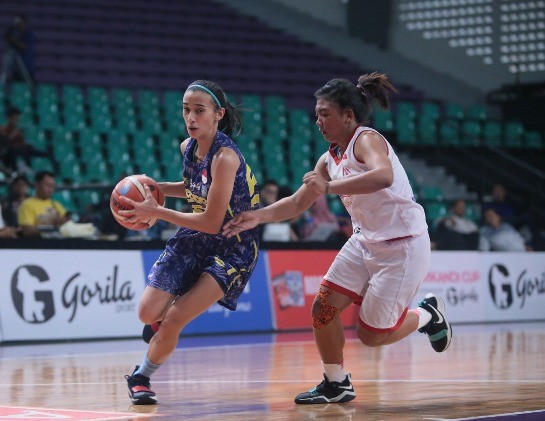 Pemain Merpati Bali Helena Tumbelaka di pertandingan melawan Sahabat Semarang di Seri 2 Srikandi Cup 2018. - Image