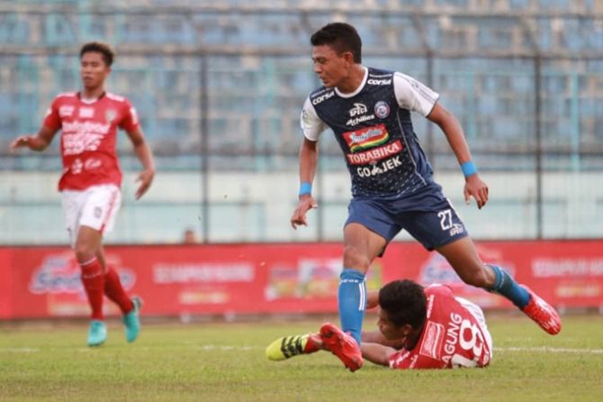 Arema sukses raup tiga poin saat jamu Bali United. - Image