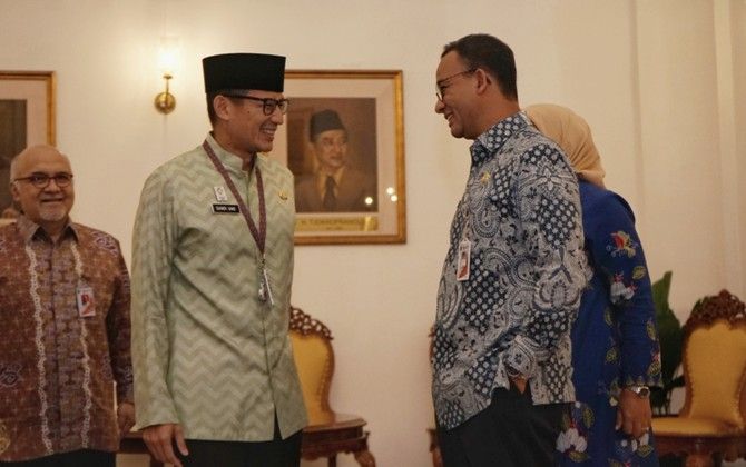Gubernur DKI Anies Baswedan dan Mantan Wakil Gubernur Sandiaga Uno. - Image