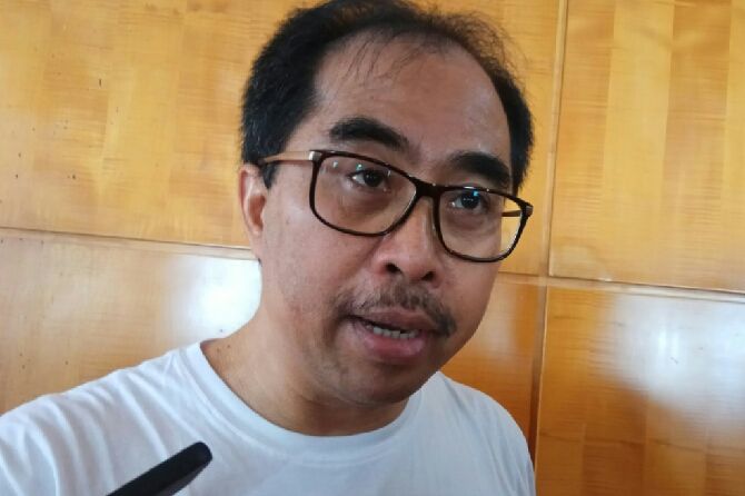 Staf Khusus Menteri PUPR, Firdaus Ali saat diwawancarai awak media di sela-sela seminar anti hoax bertema - Image