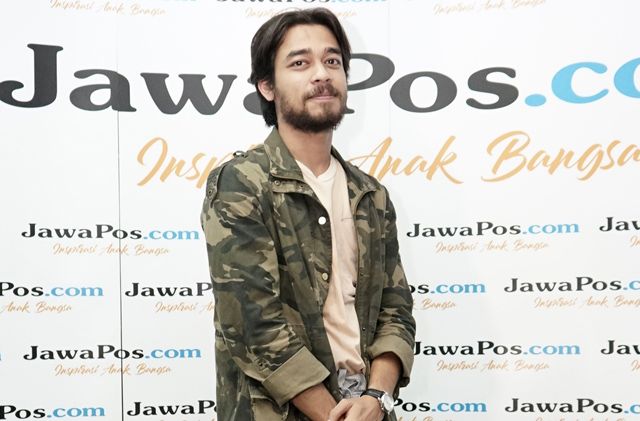 Wafda Saifan memiliki hobi main vespa. Ia bahkan tak segan bantu pengendara vespa lainnya saat mogok di jalan. - Image