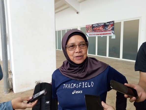 Pelatih atletik Indonesia Eni Nuraini - Image