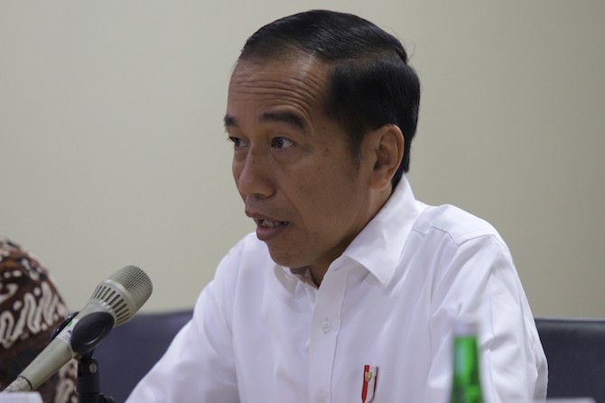 Presiden Joko Widodo (tengah) saat menyambangi Kantor PT PLN, Jakarta, Senin (5/8/2019). Foto: Dery Ridwansah/ JawaPos.com - Image