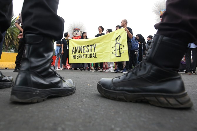 Amnesty International Ungkap Temuan Kampanye Disinformasi untuk Serang Aktivis dan Jurnalis Sebagai Antek Asing - Image