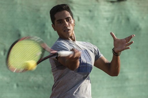 Youssef Hossam, a 19-year-old Egyptian tennis player currently holding an ATP 334 ranking, trains at a court in the capital Cairo - Image