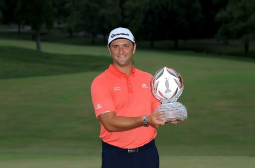 DUBLIN, OHIO - JULY 19: Jon Rahm of Spain celebrates with the trophy after winning during the final round of The Memorial Tournament on July 19, 2020 at Muirfield Village Golf Club in Dublin, Ohio. Sam Greenwood/Getty Images/AFP - Image