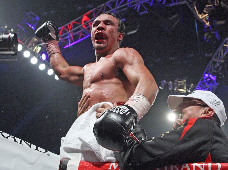 Juan Manuel Marquez celebrates after he knocked out Manny Pacquiao in the 6th round of their welterweight fight on December 8, 2012, at the MGM Grand Garden in Las Vegas, Nevada. AFP PHOTO / John Gurzinski (Photo by JOHN GURZINSKI / AFP) - Image