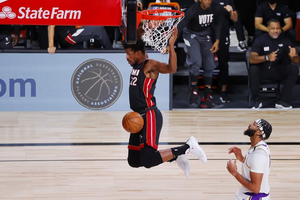 LAKE BUENA VISTA, FLORIDA - OCTOBER 04: Jimmy Butler #22 of the Miami Heat dunks the ball during the first half against the Los Angeles Lakers in Game Three of the 2020 NBA Finals at AdventHealth Arena at ESPN Wide World Of Sports Complex on October 04, 2 - Image