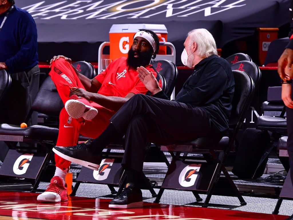 HOUSTON, TX - DECEMBER 15: James Harden #13 of the Houston Rockets talks with Gregg Poppovich of the San Antonio Spurs before the game on December 15, 2020 at the Toyota Center in Houston, Texas. NOTE TO USER: User expressly acknowledges and agrees that, - Image