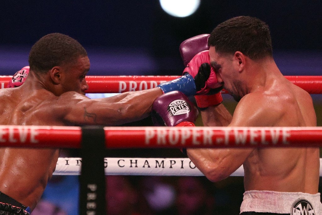 ARLINGTON, TEXAS - DECEMBER 05: (L-R) Errol Spence Jr. and Danny Garcia during their WBC & IBF World Welterweight Championship fight at AT&T Stadium on December 05, 2020 in Arlington, Texas. Ronald Martinez/Getty Images/AFP - Image