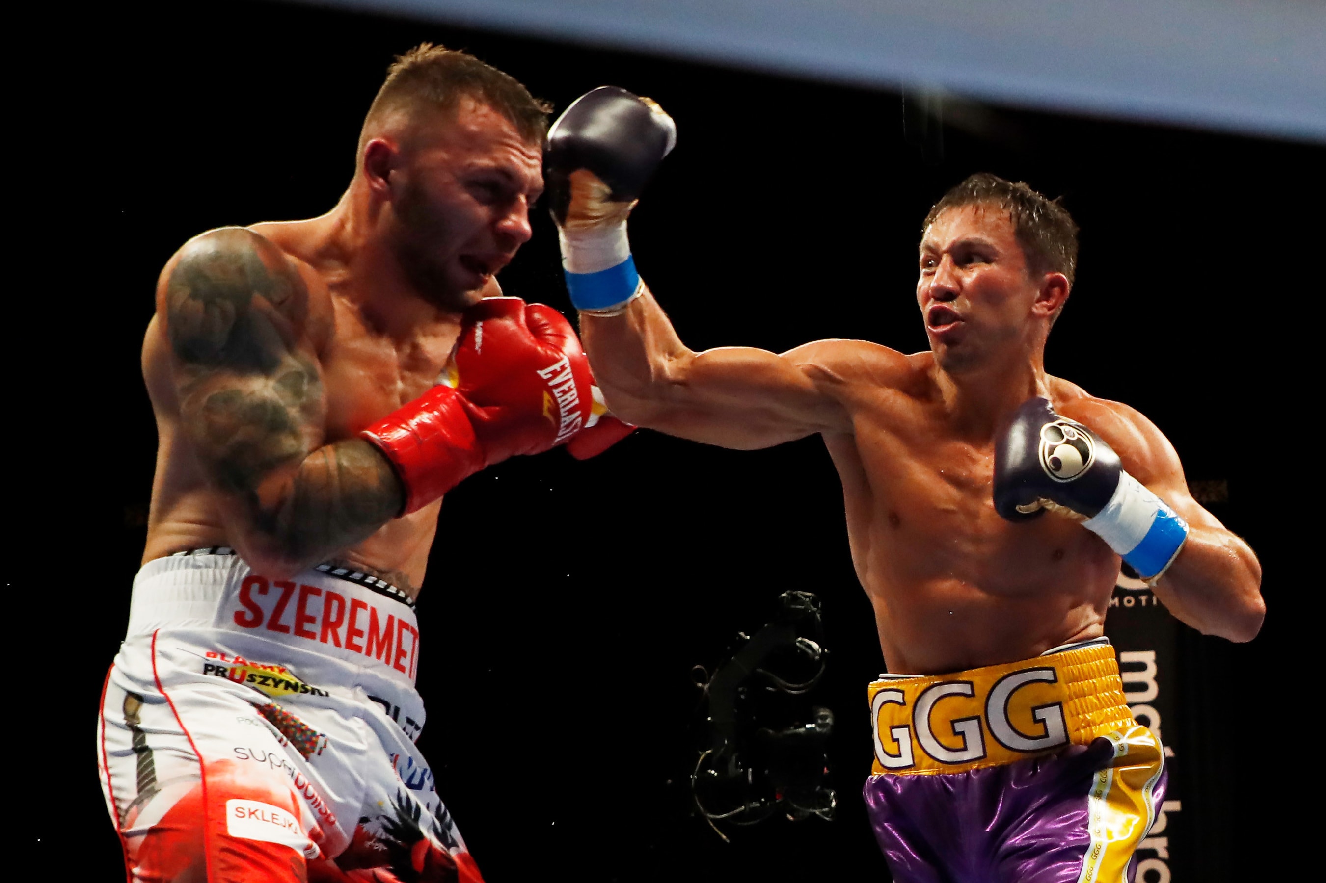 HOLLYWOOD, FLORIDA - DECEMBER 18: Gennadiy Golovkin and Kamil Szeremeta exchange blows in their IBF Middleweight title bout at Seminole Hard Rock Hotel & Casino on December 18, 2020 in Hollywood, Florida. Cliff Hawkins/Getty Images/AFP - Image