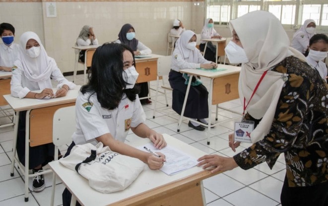 Pelaksanaan uji coba PTM di masa pandemi. Alfian Rizal/JawaPos - Image