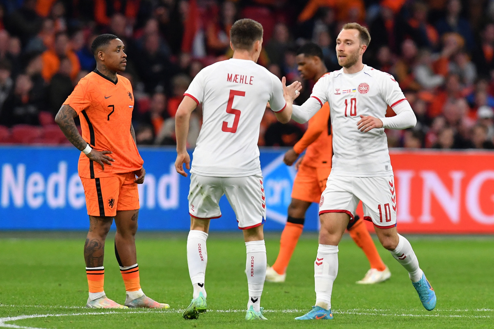 Gelandang timnas Denmark Christian Eriksen saat laga uji coba lawan Belanda. (John thys/AFP) - Image