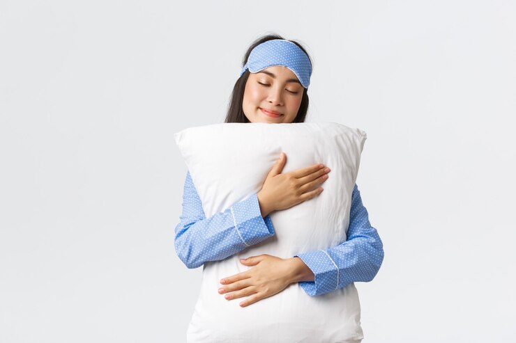 Ilustrasi seseorang yang memeluk bantal