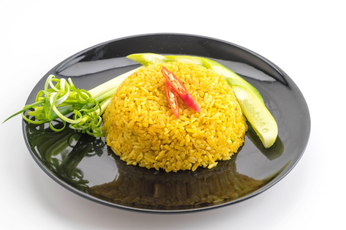 Ilustrasi nasi kuning (Dok. Freepik)