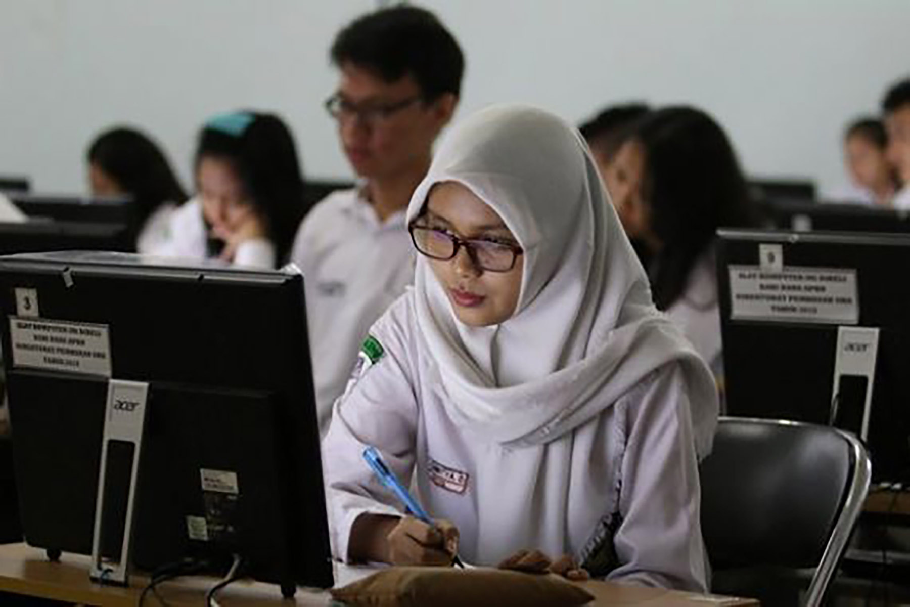 Ilustrasi - Siswa mengikuti Ujian Nasional. (Dok. Jawa Pos)