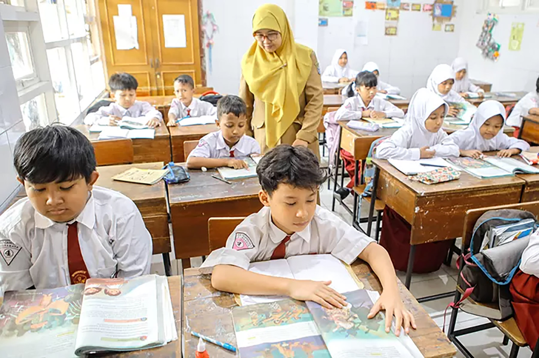 Ilustrasi  - Situasi pembelajaran anak sekolah dasar (SD) (Dipta Wahyu/Jawa Pos)