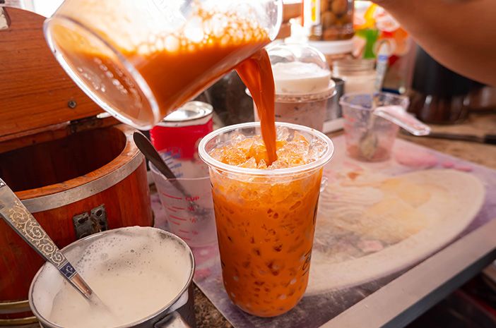 Ilustrasi segelas Thai Tea. (Dok. Halodoc)
