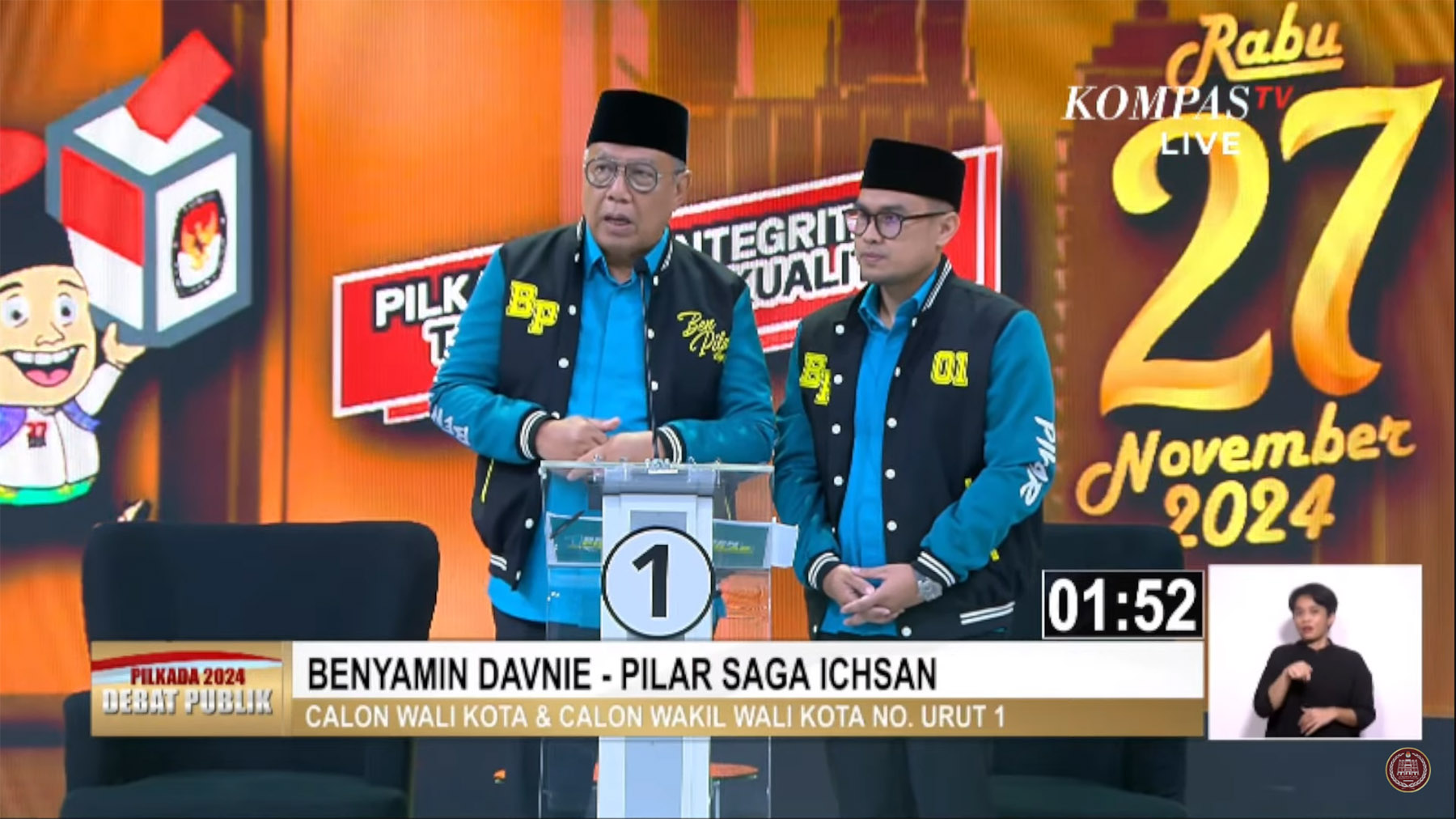 Tangkapan Layar - Calon Wali Kota dan Calon Wakil Wali Kota Nomor Urut 1 Benyamin-Pilar Dalam Debat Kedua Pilkada Tangsel Kamis (21/11/2024). (Sumber: Dok. YouTube KPU Tangerang Selatan)