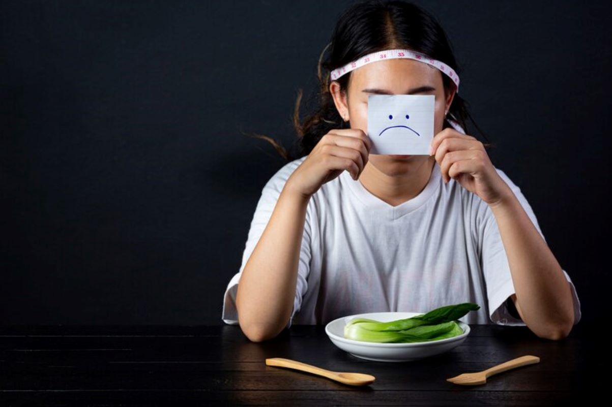 Ilustrasi seseorang yang mengalami gangguan makan. (Freepik/jcomp)