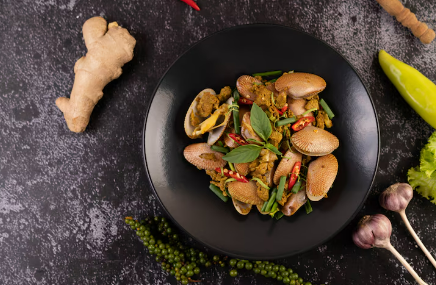 Ilustrasi cara membuat tumis kerang cabe ijo (Dok. Freepik)